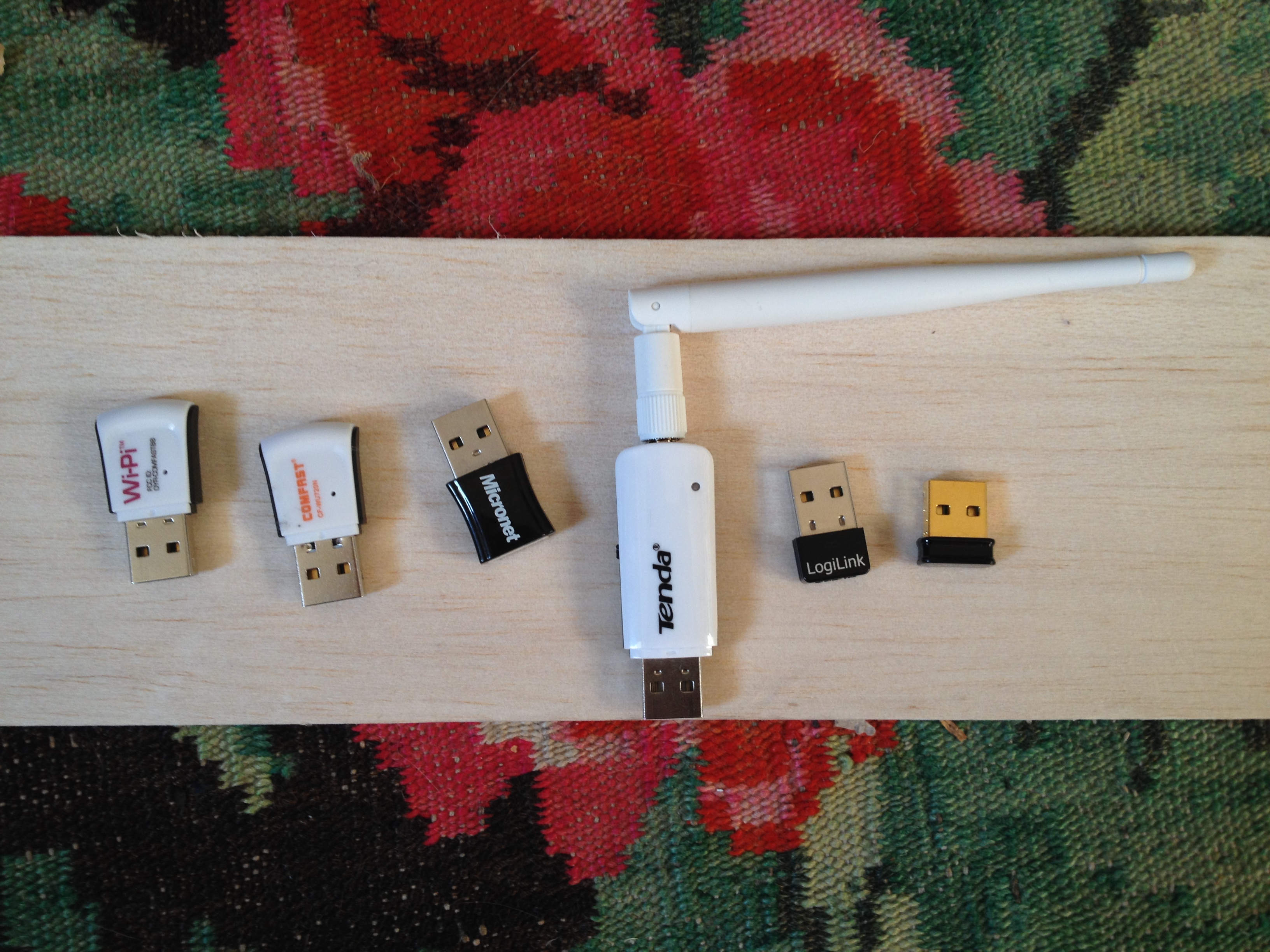 A selection of wifi cards: left to right: Wipi, Comfast, Micronet, Tenda, Loglink, Edimax